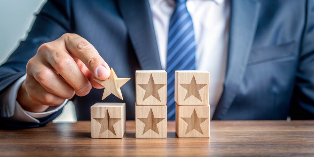 man is playing game wooden blocks with stars top